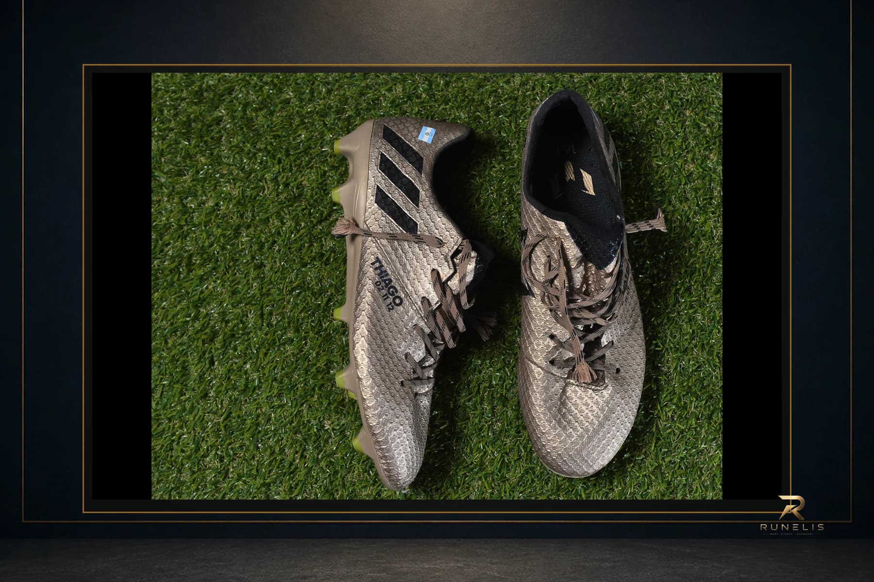 Runelis archival presentation using a source photograph of gold Adidas football boots