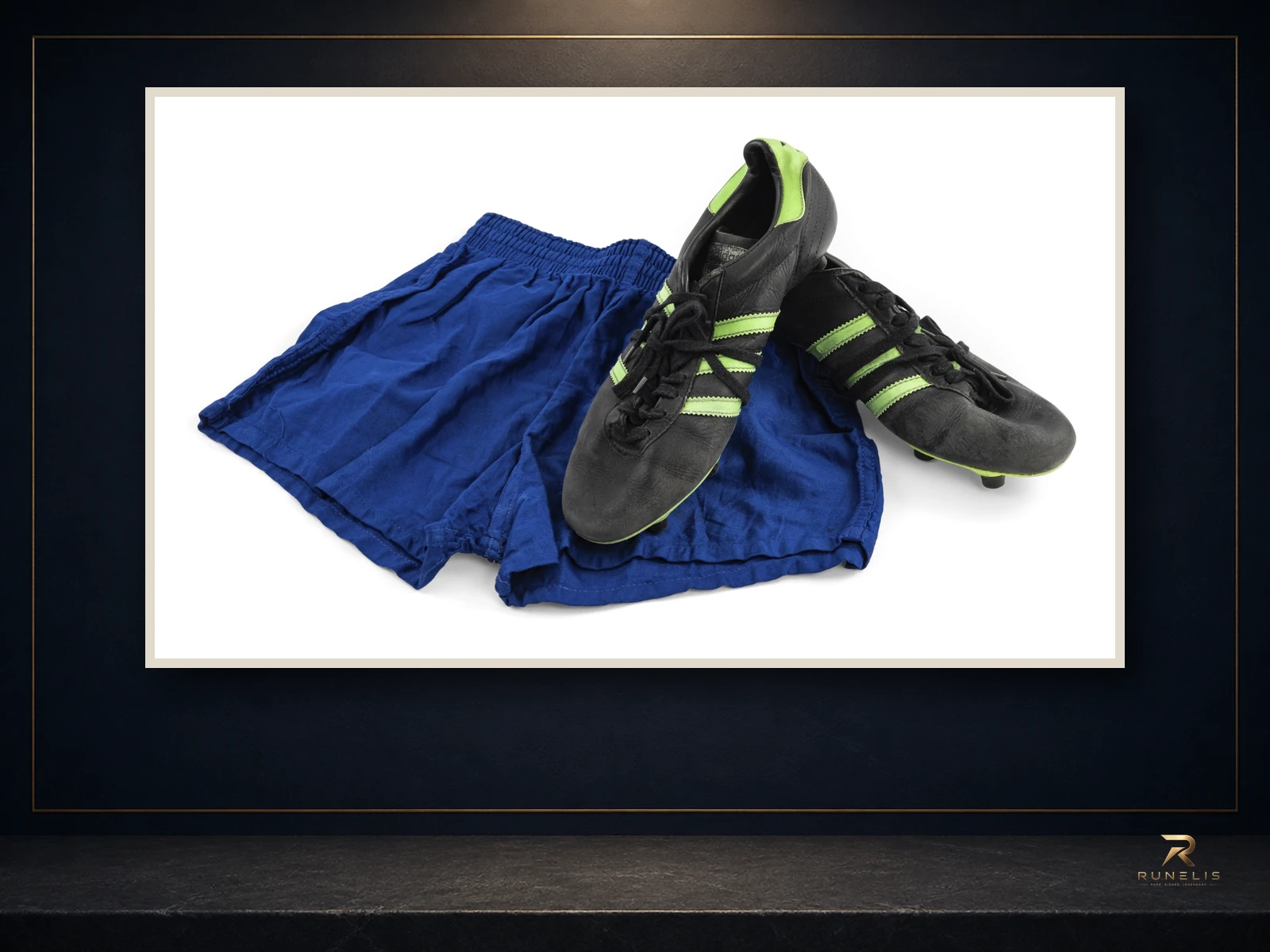 Source photograph of George Best Match-Worn Adidas Boots and Training Shorts — 1970s